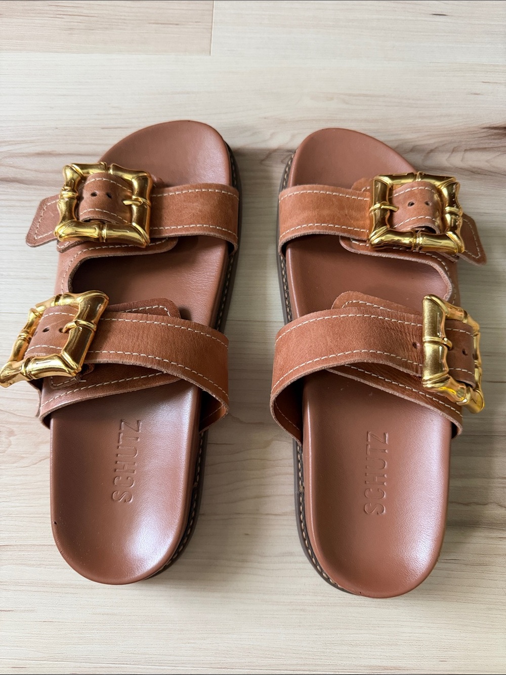 SCHUTZ Cognac Leather Double-Buckle Slide Sandals with Gold Hardware